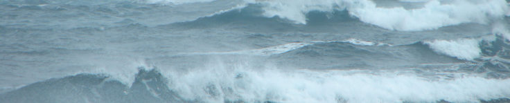 Sea-Stacks off Fildes Peninsula in rough weather. King George Island.
