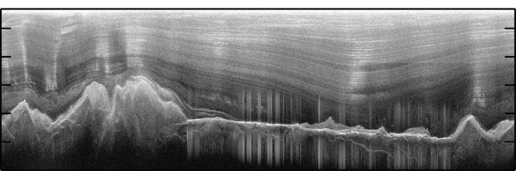 Images of the ice-covered Gamburtsev Mountains revealed water-filled valleys, as seen by the cluster of vertical lines in this image (Tim Creyts, University of Columbia)