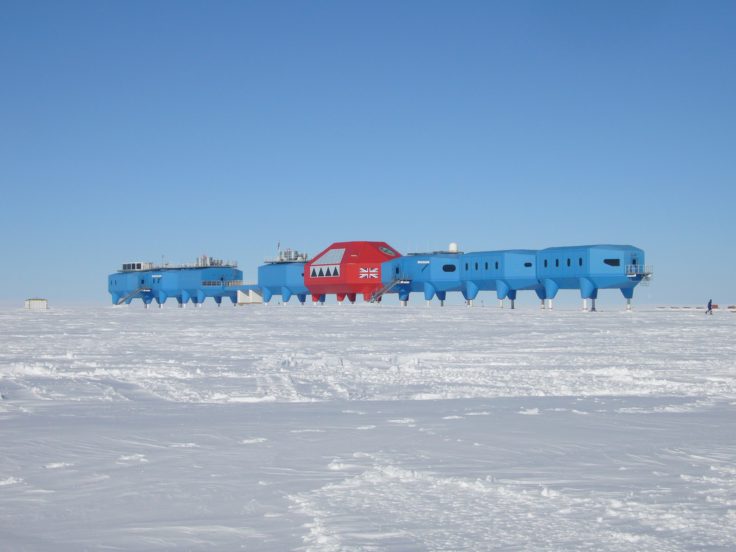 Landscape image of Halley VI station in the background, and the brunt ice-shelf in the foreground.