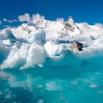 A close up of a snow covered mountain.