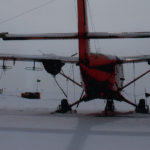 BAS aeroplane on top of a snow covered slope