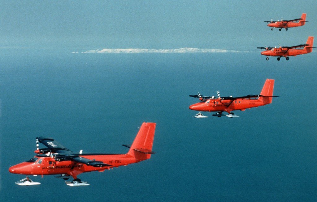 The BAS fleet of four Twin Otter aircraft flying in formation on their journey from England to the Antarctic Peninsula