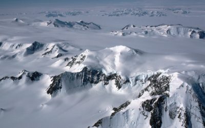 Mountains and glaciers of the Antarctic Peninsula from the air.