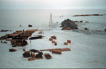 View of snowed up station complex taken from the met mast, 1956-57. (Photographer: unknown; Archives ref: AD6/19/3/C/Z6).