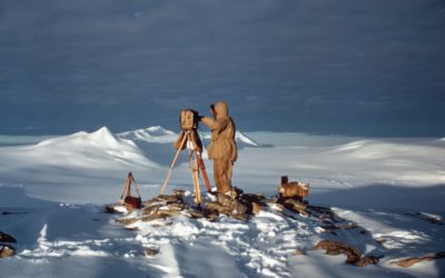 A group of people that are standing in the snow.