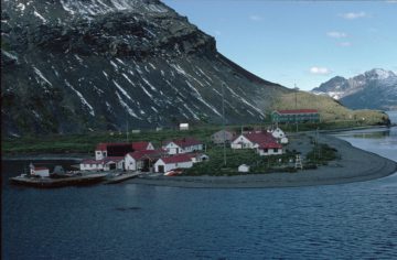 Buildings on King Edward Point, viewed from the sea, 1979-80. (Photographer: Christopher Gilbert; Archives ref: AD6/19/4/1/6/35/19)