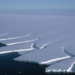 Icebergs calving from the edge of the Brunt Ice shelf, Weddell Sea.