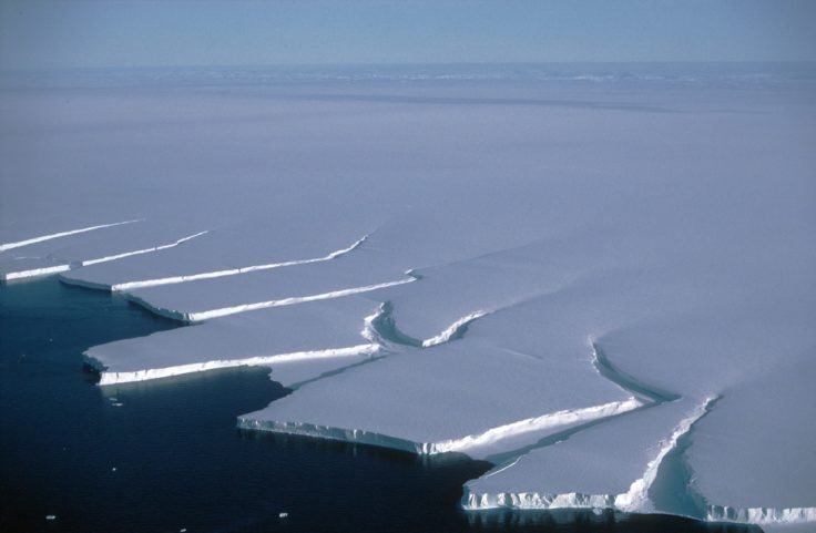 Icebergs calving from the edge of the Brunt Ice shelf, Weddell Sea.