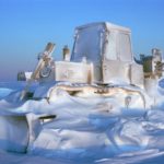 The reality of winter at Halley research station where temperatures may drop below -50 degrees Celsius. An International Harvester Bulldozer is encased in a frost of spin-drift and drifted snow through the winter of 1995. Once the bulldozer's engine preheaters are switched on, the vehicle could be running in an hour.