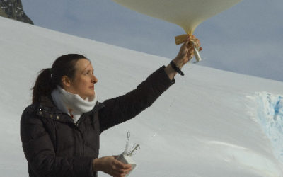 A scientist prepares to launch a meteorological balloon at Rothera Research Station, Antarctica