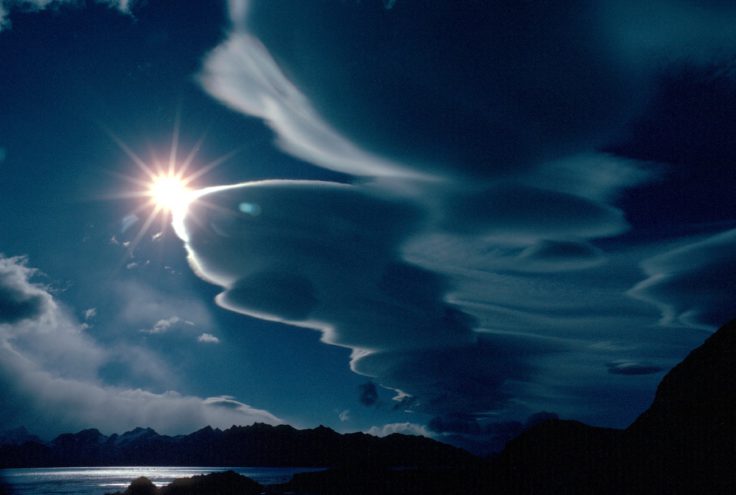 A stack of plate clouds above South Georgia - altocumulus lenticularis - stationary wave clouds caused by airflow over mountains