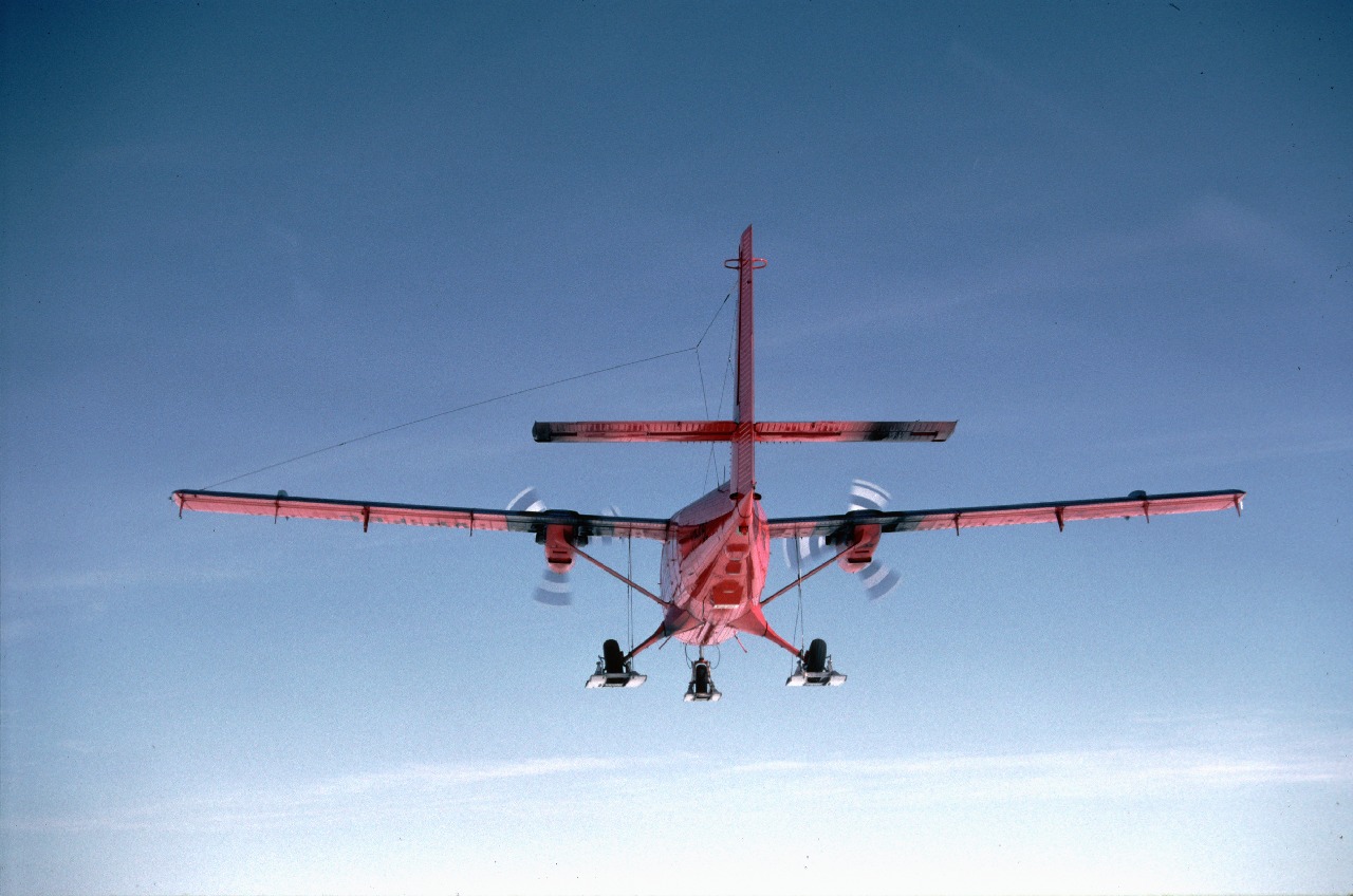 A BAS Twin Otter aircraft over Alexander Island