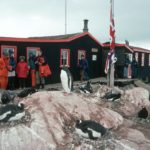 Visitors to the Antarctic Heritage site of Port Lockroy on the Antarctic Peninsula. Port Lockroy was established in 1944 is the only surviving base from Operation Tabarin and is one of the most visited tourist sites in Antarctica.