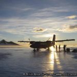 BAS Twin otter Aircraft refuels at Sky Blu runway under the midnight sun
