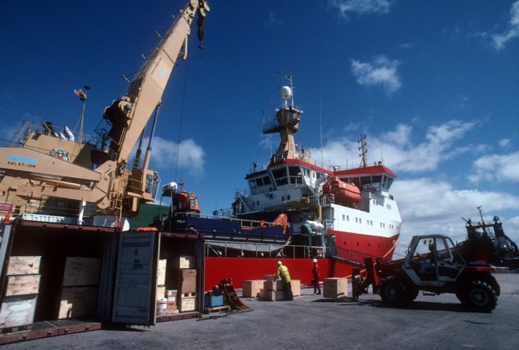 RRS Ernest Shackleton loading cargo at Maire Harbour, Falkland Islands