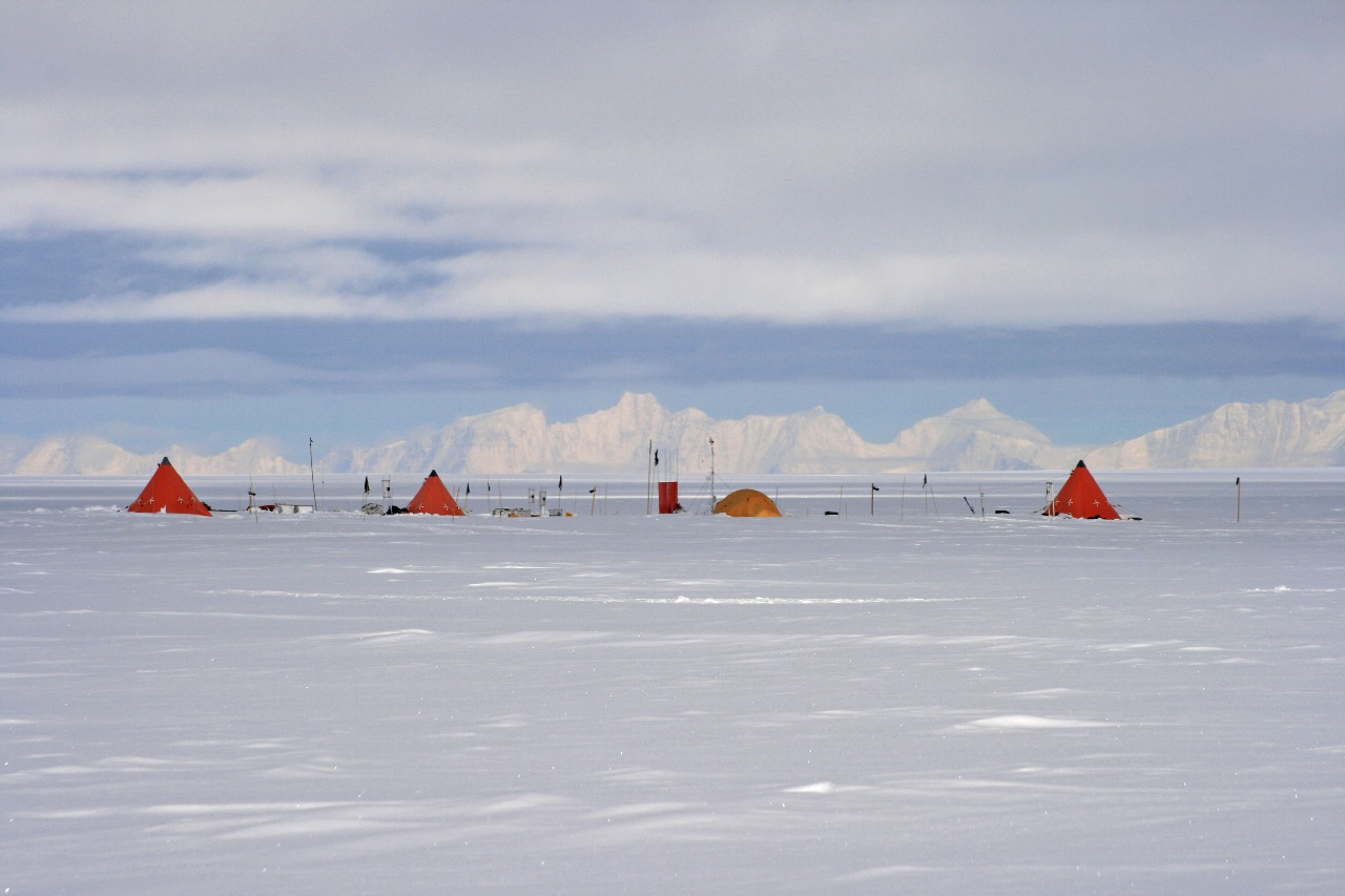 A airplane that is covered in snow.
