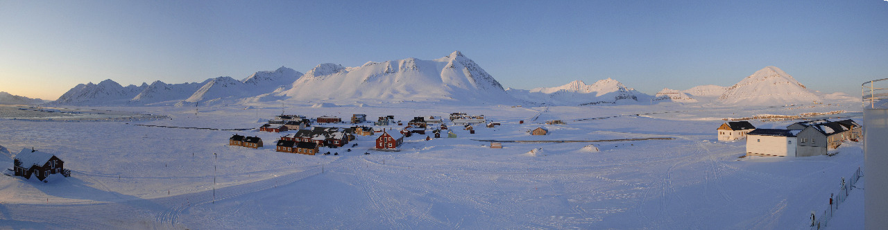 A close up of a snow covered mountain.