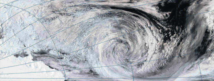 A close up of a snow covered slope.