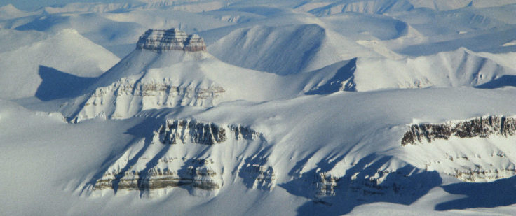 A view of a snow covered mountain.
