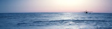 BAS twin otter aircraft on the Antarctic ice sheet.