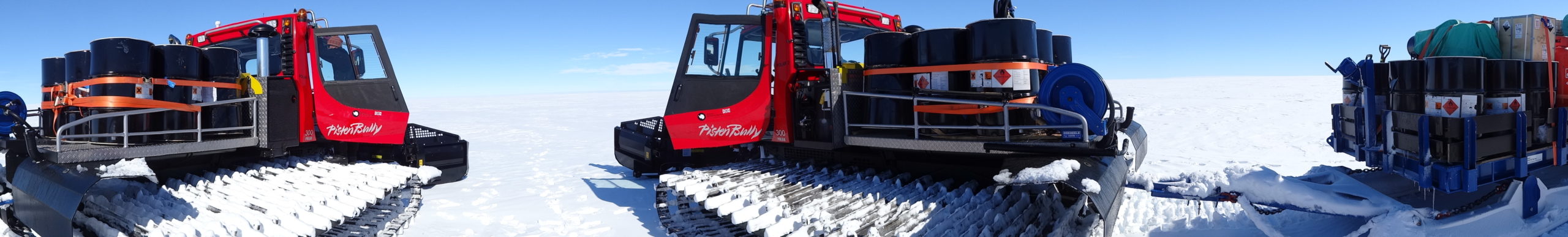 A truck that is sitting in the snow.