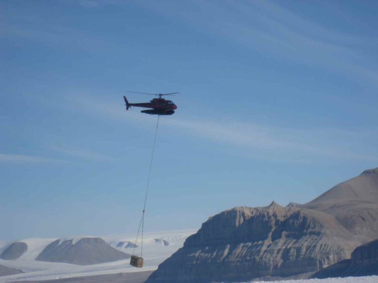 Using a helicopter to deploy equipment into the deep field