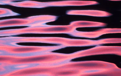 Colourful ripples on water