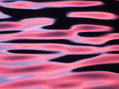 Colourful ripples on water