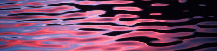 Colourful ripples on water