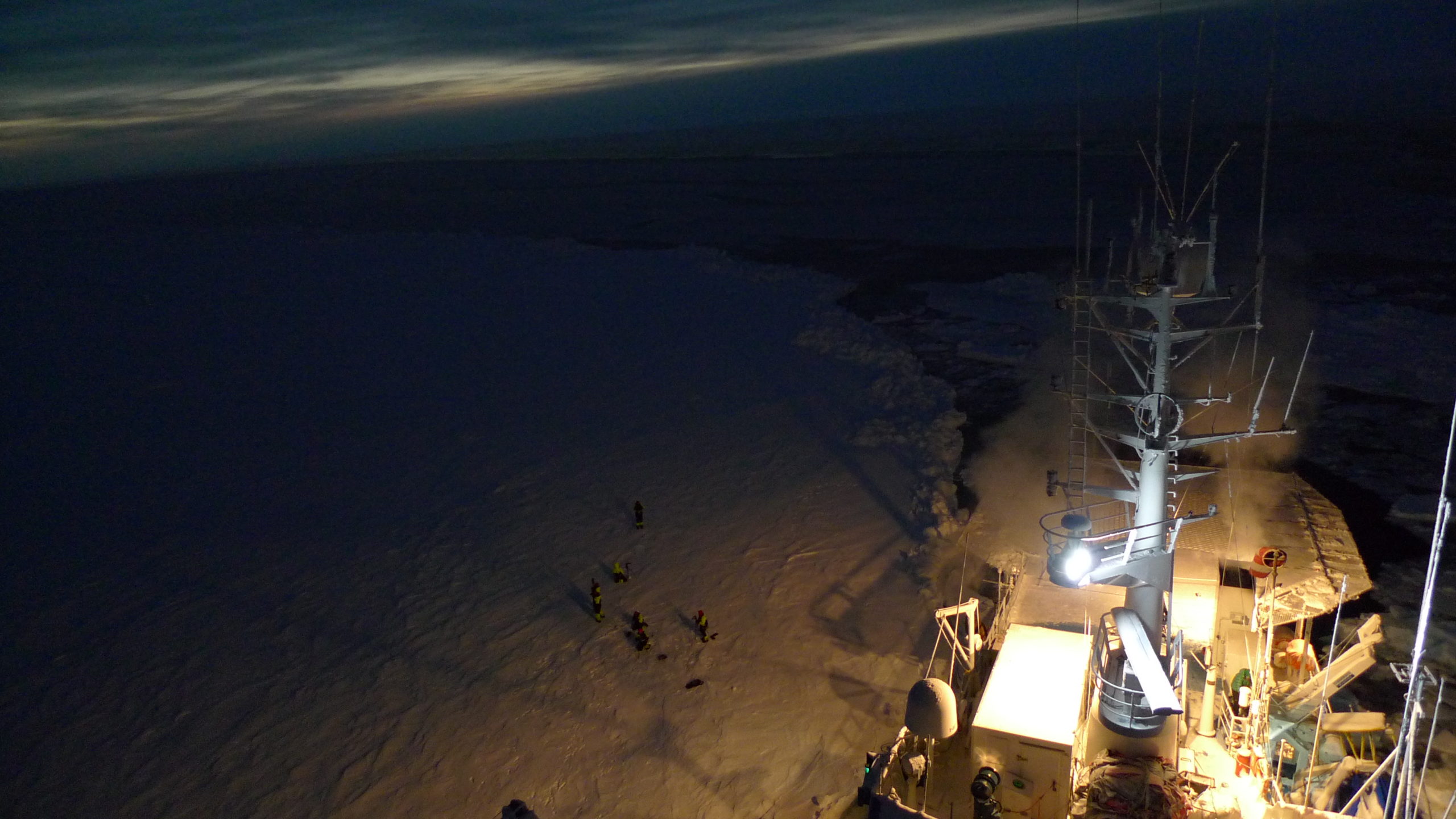 A large ship in the background.