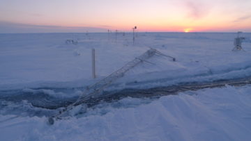 A close up of a snow covered slope.