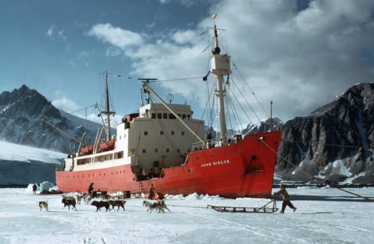 John Biscoe unloading onto ice at Stonington Island (Base E), 1969-70. (Photographer: Martin White; Archives ref: AD6/19/3/B41)