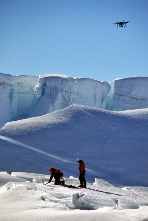 A group of people working in the snow