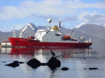A large ship in a body of water.
