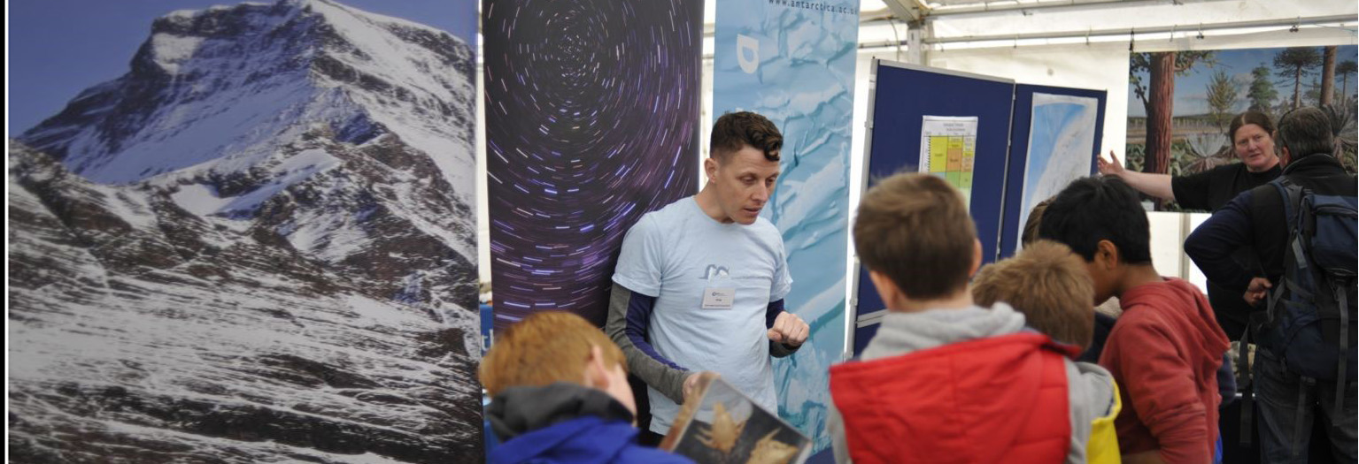 A group of people looking at each other.