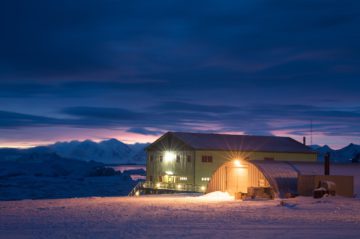 A building next to a body of water.