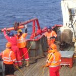 A magnetometer is deployed over the side of the RRS James Clark Ross