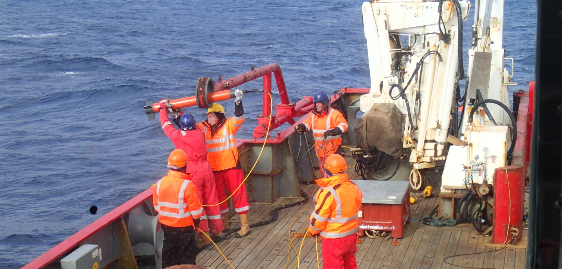 A magnetometer is deployed over the side of the RRS James Clark Ross