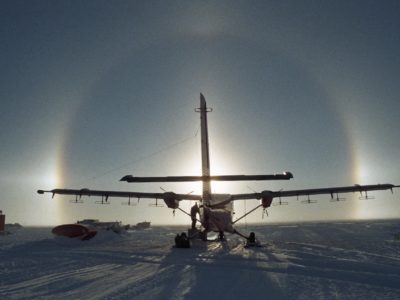 A small airplane sitting on top of a runway.