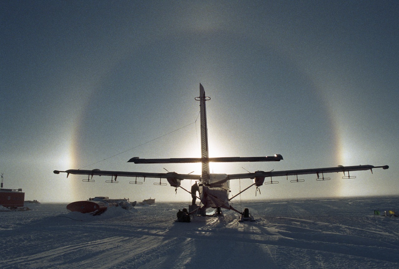 A small airplane sitting on top of a runway.
