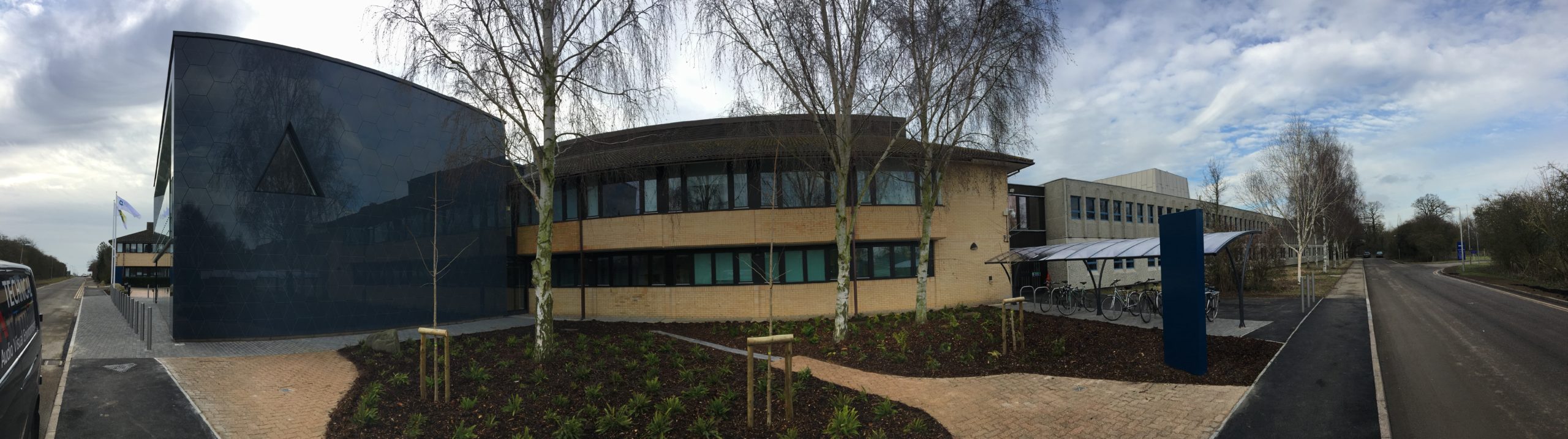 A house with trees in the front yard.