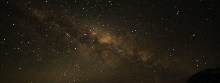 A star in the middle of the night sky.