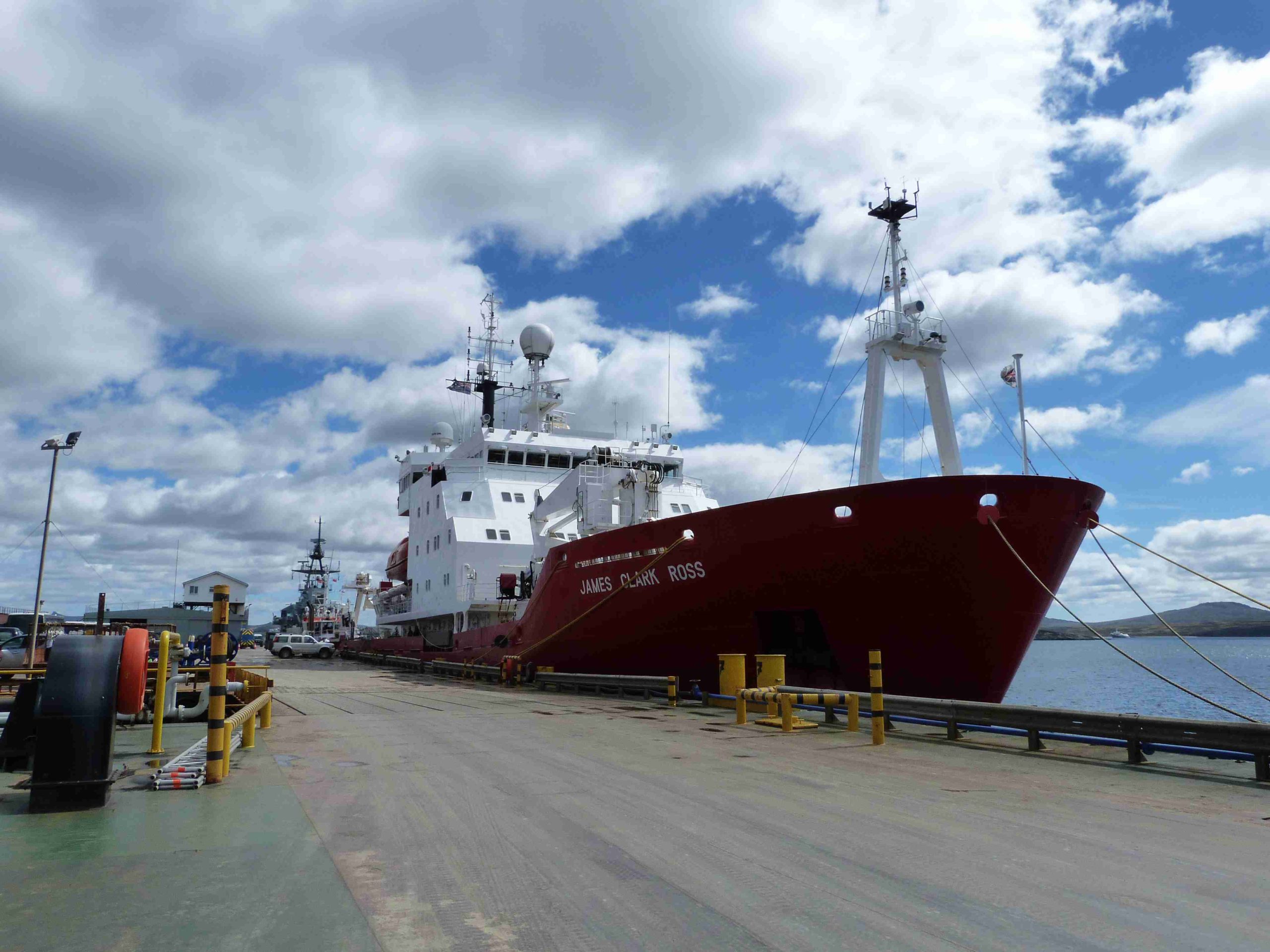A large ship in the background.