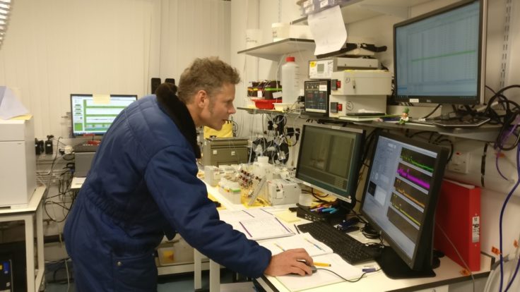 A person on a computer desk.