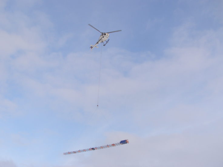 A helicopter flying in the air.