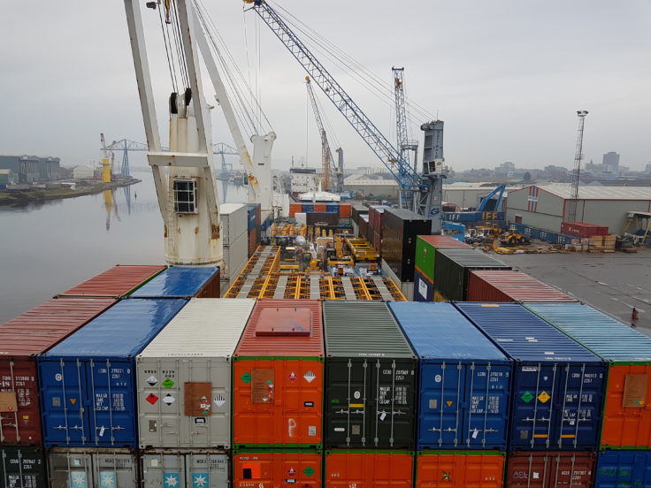 A large ship in the background.