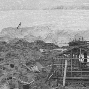 People building a hut in a snowy landscape