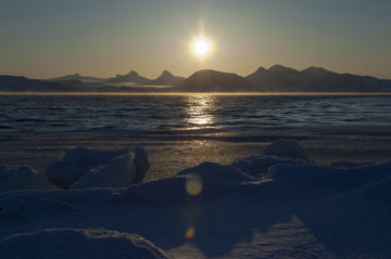 A sunset over a body of water.