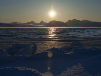 A sunset over a body of water.