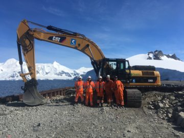 A tractor in the snow.